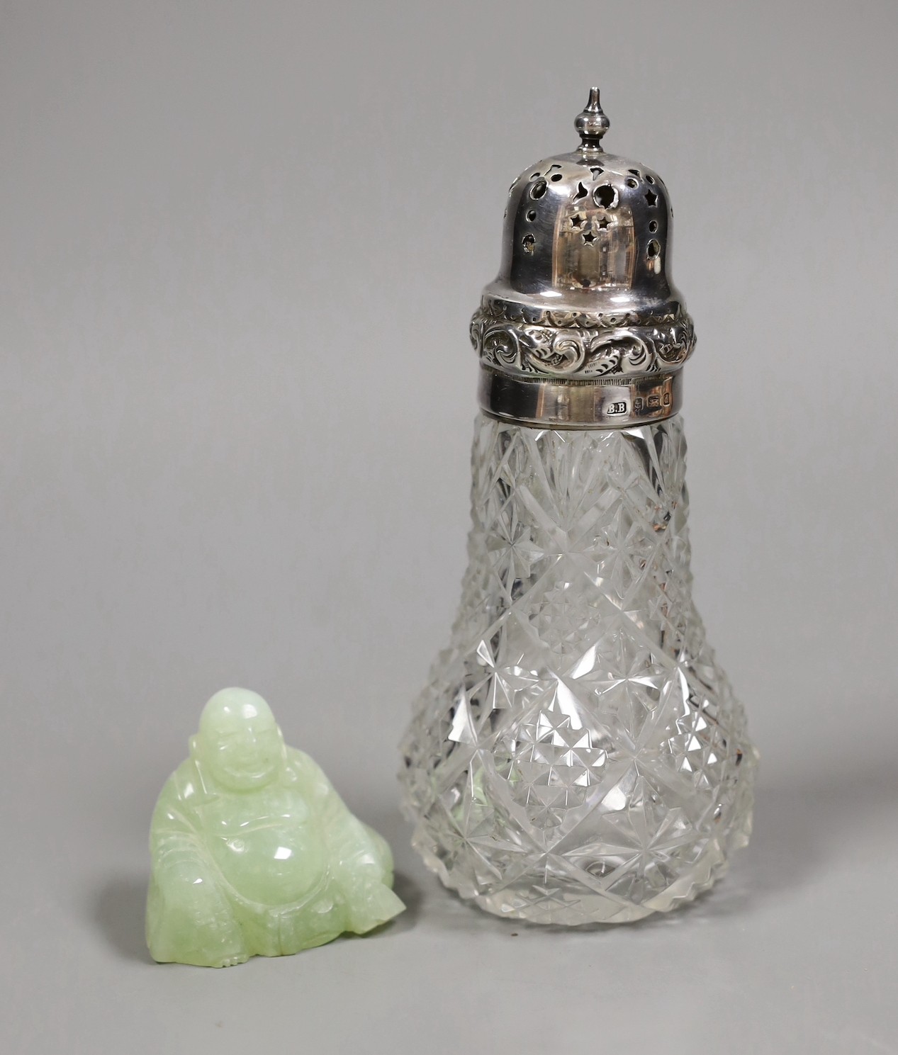 A Chinese bowenite buddha, a Chinese provincial dish, a Derby 1128 dish, a Silver mounted sugar sifter and other miscellaneous items